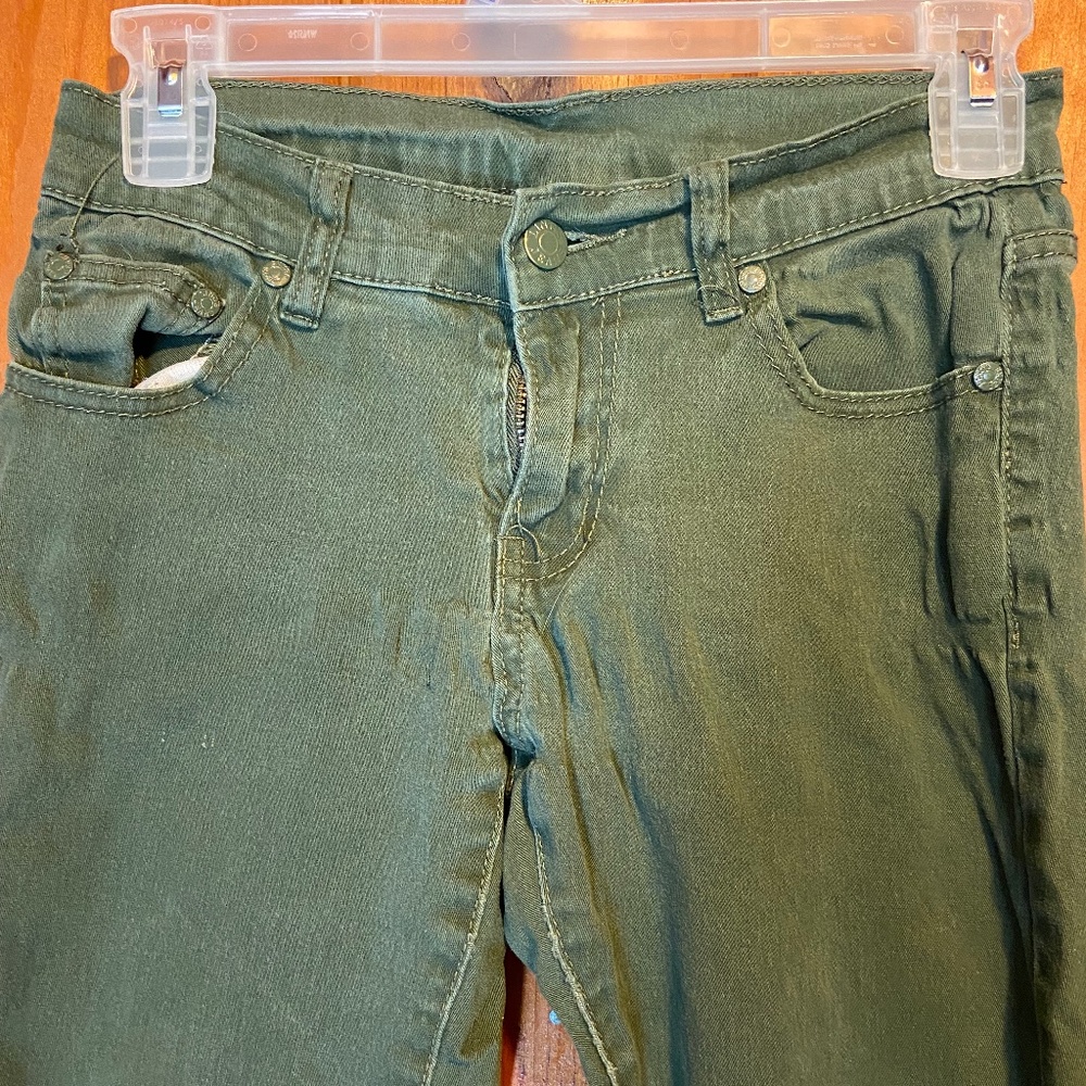 Green skinny jeans